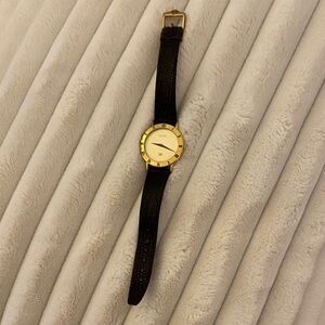 Gucci Gold and Black Roman Numeral Watch